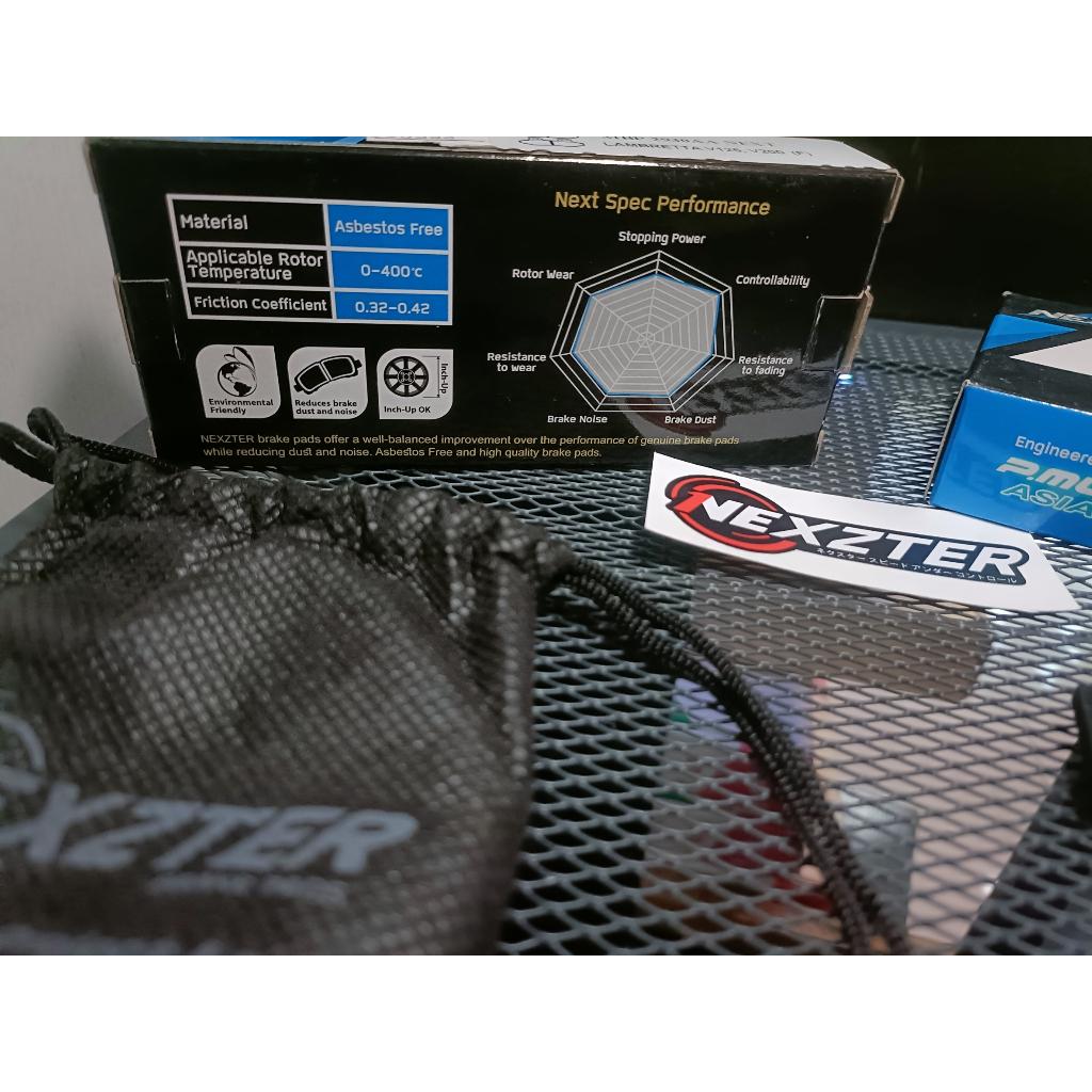 39.ผ้าเบรคหลัง NEXZTER  106107AA ใส่รถรุ่น KAWASAKI KTX 125,150,250 / ​KLX 300R,250 / D-TRACKER
