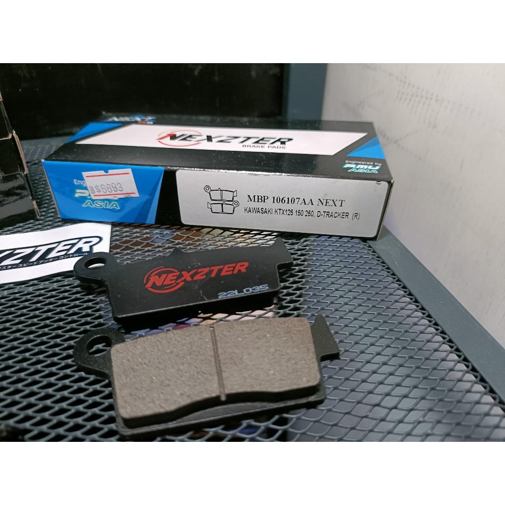39.ผ้าเบรคหลัง NEXZTER  106107AA ใส่รถรุ่น KAWASAKI KTX 125,150,250 / ​KLX 300R,250 / D-TRACKER