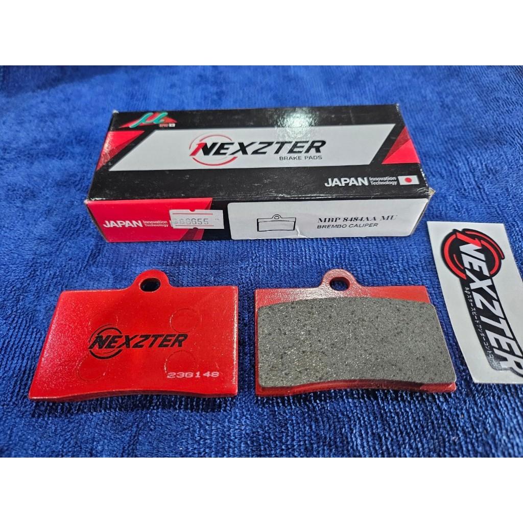 29. ผ้าเบรคหน้า NEXZTER 8484AA ผ้าเบรคปั๊ม BREMBO CALIPER 4 POT หูชิด
