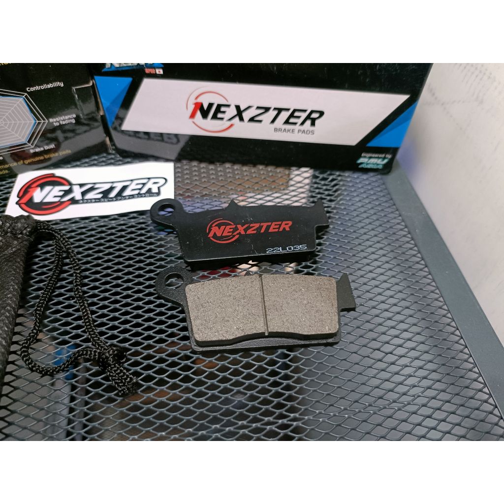 ผ้าเบรคหลัง NEXZTER  106107AA ใส่รถรุ่น KAWASAKI KTX 125,150,250 / ​KLX 300R,250 / D-TRACKER.39