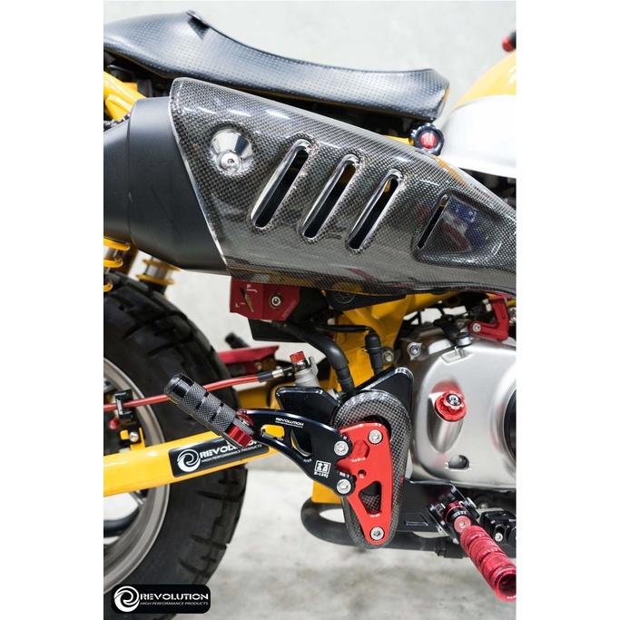 พักเท้าหลัง CNC ST-125 DAX  แบรนด์ REVOLUTION